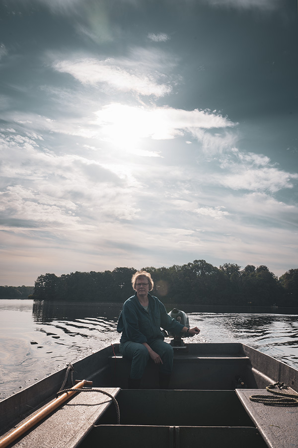 Binnensee, Eutin, Fischerin, Boot, Wasser, Natur, blauer Himmel, Sonne, Wolken